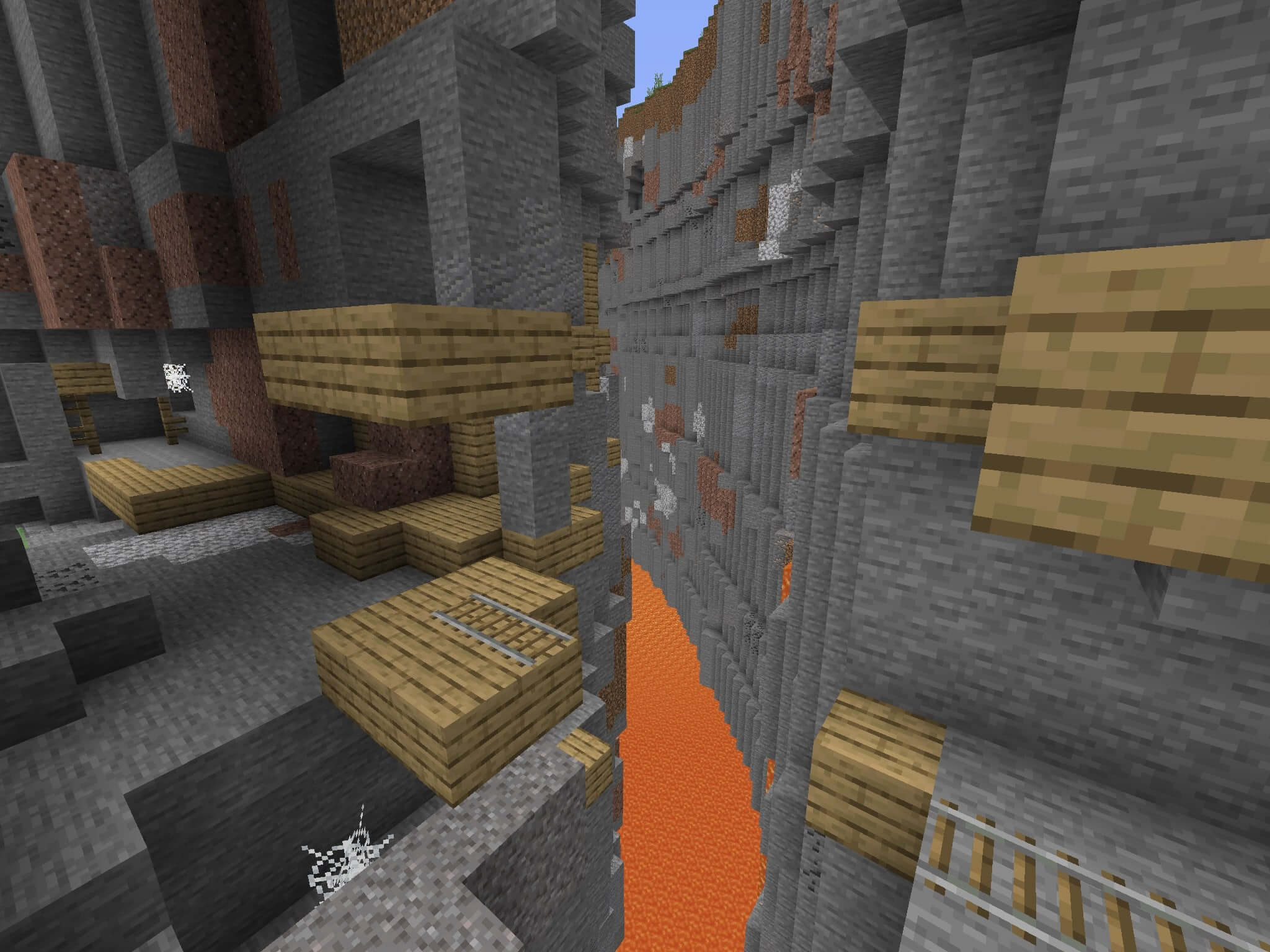 2048971879 - A Terrible Chasm With a Mine Seed Minecraft PE.